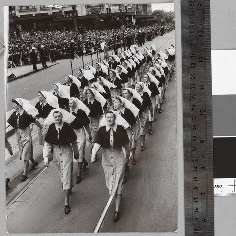 Air Force Nurses eyes-right at the [Melbourne] Town Hall Saluting Base, c. 1940
