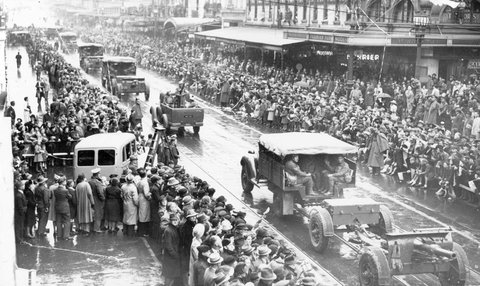 Looking up Swanston Street from Collins Street at cavalry (?) or artillery units during Empire Day drive for recruits, c. 1941