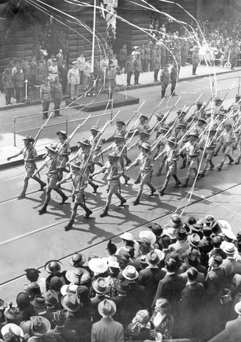 Australian servicemen marching past the saluting base outside the Melbourne Town Hall, Swanston Street, Melbourne, 1940–45