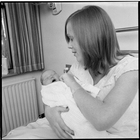 St. Georges hospital, Kew. Ladies Auxiliary and a bassinet - with new mother and baby, 1979