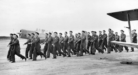Air crew pilot trainees from Victor Harbour and Somers R.A.A.F. initial training schools photographed on first day at Essendon Elementary Flying Training School where they will learn to fly, 1941?