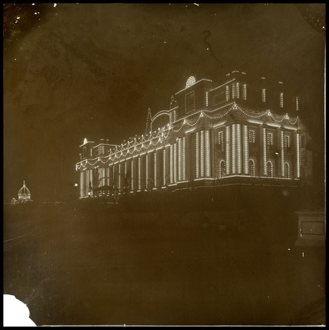 Parliament House, Melbourne, with decorations at night for Royal Visit, 1875–1938