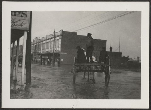 Flooded Barkly Street and some family photographs Footscray Victoria, 1924
