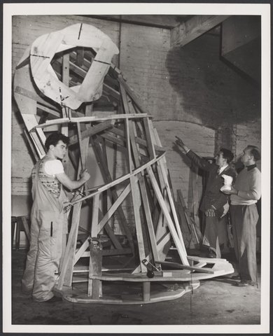 Men working on the construction of the Christmas Facade of Coles Bourke Street Store No. 12, 1954