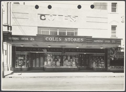 Shopfront with display windows featuring "Death to Flies" products and ladies' wear-remodelled Collingwood Coles Variety Store No. 1, 1936–37