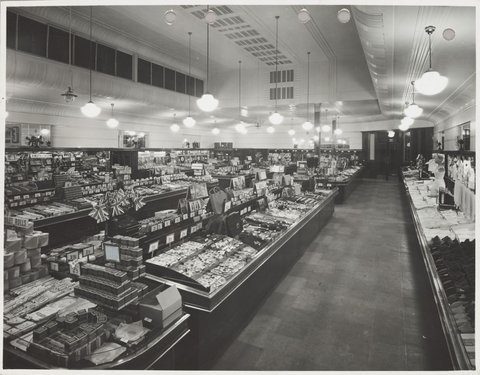 Elevated view of interior showing counters displaying women's clothing toiletries and haberdashery at Coles St. Kilda Store No. 64, 1947