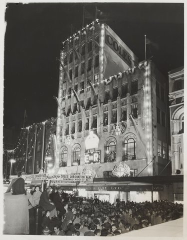 Exterior decorations and crowd at the Coles Coronation Party for Queen Elizabeth II Bourke Street Store No. 12, 1953