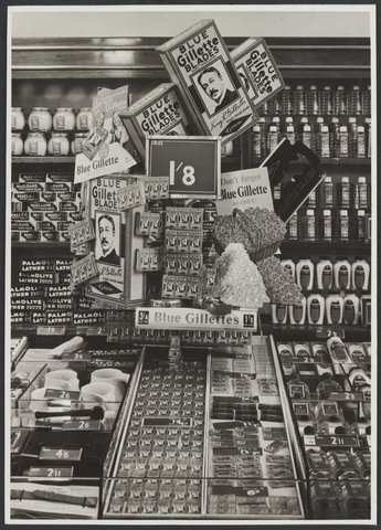 Interior of Coles Swanston Street store displaying Gillette blades priced at 1/8d Store No. 7, 1949