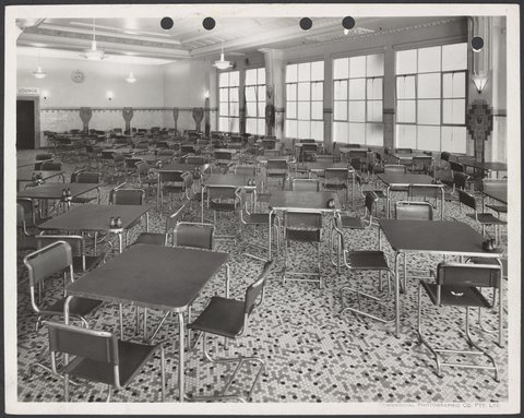 Elevated view of empty canteen with tables chairs and tiled floor in Coles Bourke Street Store No. 12, 1939