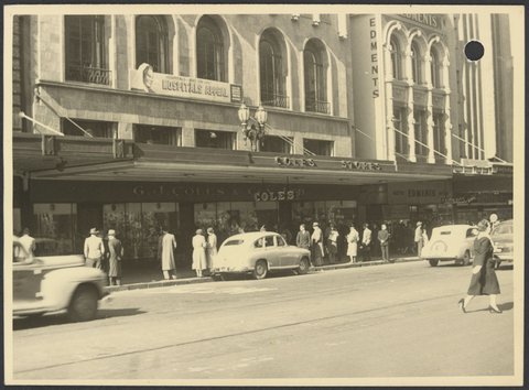 Closer view of store with shoppers in front of Coles Bourke Street Store No. 12, 1940–50