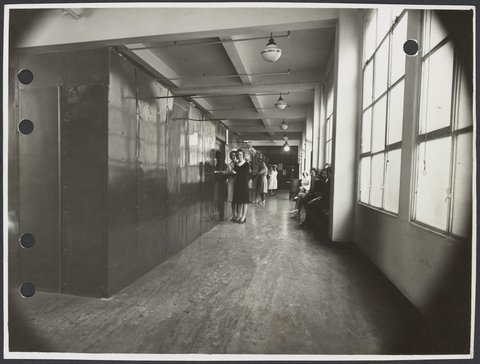 Female staff in women's locker room in Coles Bourke Street Store No. 12, 1947–50
