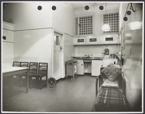 Female staff's rest room showing day bed kitchen area and table in Coles Collingwood Store No. 1, 1936