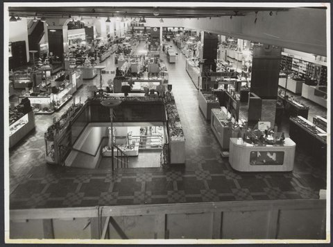Interior viewed from second floor showing counters and cabinets in aisles, Mantons Bourke Street store, 1942–51