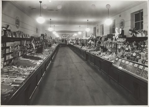 Interior of Coles Swan Street store showing Colgate toothpaste for 6d. and loose confectionary bought by weight Richmond Store No. 19, 1940–50