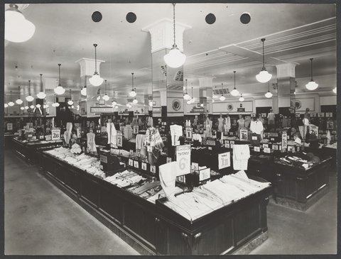 Interior of Buckley's store showing counters of manchester and clothing with prices prominently displayed in Melbourne Coles Variety Store No. 4, 1934