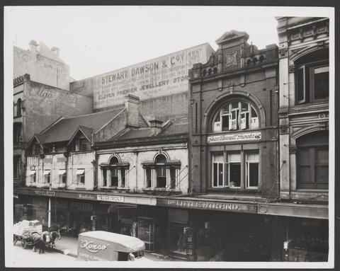 Row of shops King Street, buildings 117 to 105 later demolished possibly location Pitt Street Coles Store No. 130, 1940–50