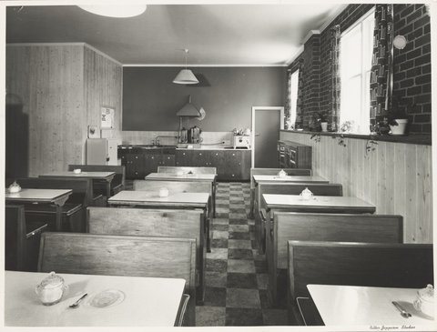 Dining area at Coles cafeteria including wooden booths at Coburg Store No. 21, 1947