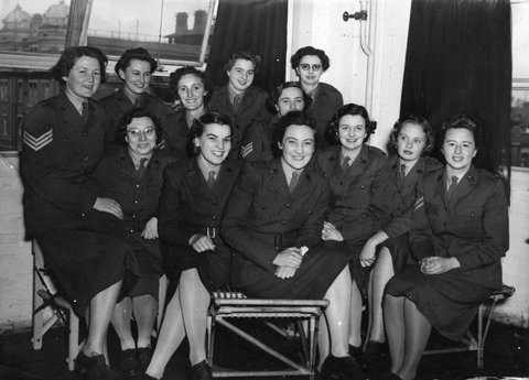 A.W.A.S. Capt. Kathleen Stack from Caulfield, Vic. and group of A.W.A.S. members celebrating its first birthday, 1943–44