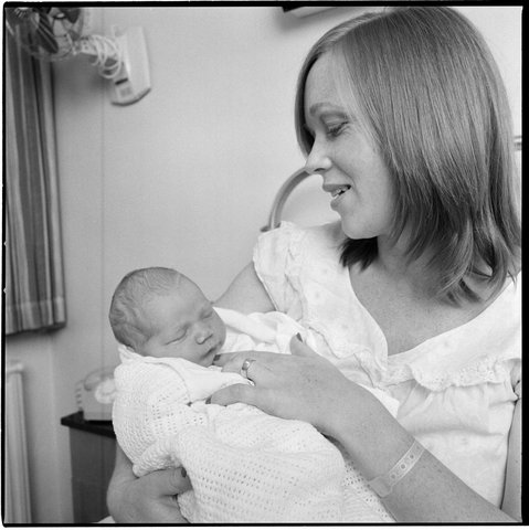 St. Georges hospital, Kew. Ladies Auxiliary and a bassinet - with new mother and baby, 1979