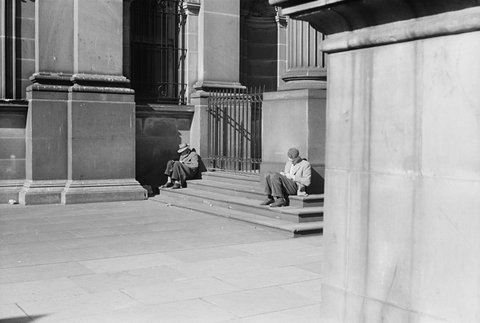 Two men on steps of State Library of Victoria, Melbourne, 1954