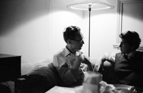 Unidentified man and woman in conversation, Melbourne, 1954