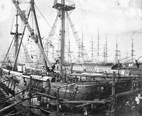 ANOTHER VIEW OF THE OLD NELSON, LIFTING HER MAIN MAST. : Launched at Woolwich 1814, as 100 gun ship. In 1859, cut down to 72 guns. Arrived at Melbourne 1867. Broken up 1898, 1867–98