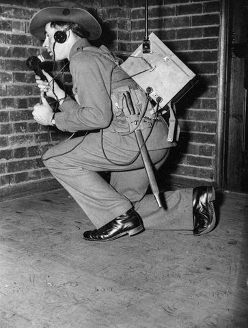 Soldier wearing wireless communication backpack during training, possibly in Melbourne during World War II, c. 1941