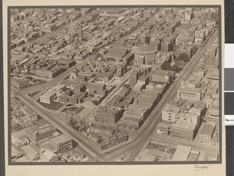 View of Swanston Street and Victoria Street showing the City Baths, RMIT and the State Library, 1927–28