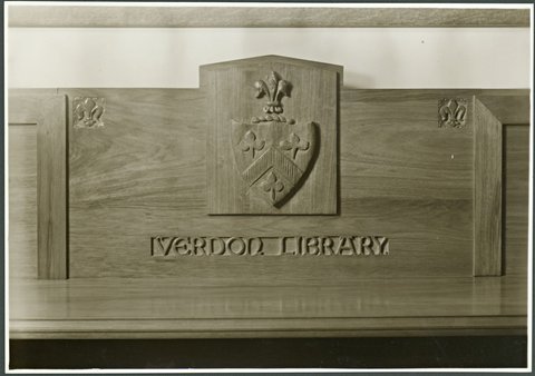 Detailed view of woodcarving of Trinity College crest at Verdon Library, Melbourne University, Parkville, Victoria, 1920–48