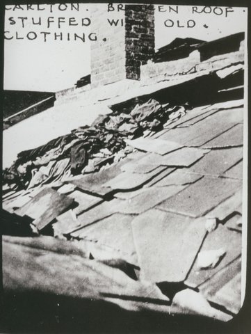 Carlton. Broken roof stuffed with old clothing, c. 1935