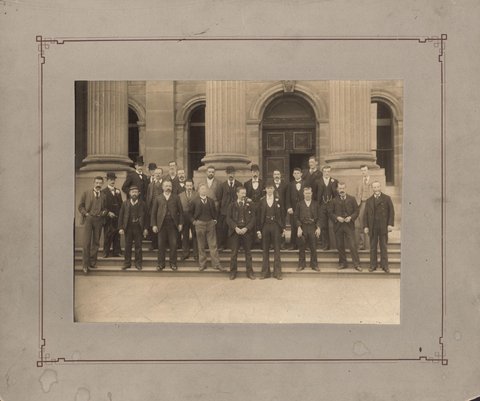 [Staff of Melbourne Public Library standing on steps of library, Swanston Street, Melbourne, Victoria], 1896–98