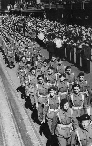 A.I.F. soldiers of the 9th Division in Swanston Street, during a march in Melbourne, 1943