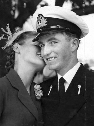Cadet Midshipman J. R. Fallonn of Williamstown received a reward from his girlfriend Ruth Colquhoune after the Passing Out Parade at the Flinders Naval Col. [i.e. College], c. 1953
