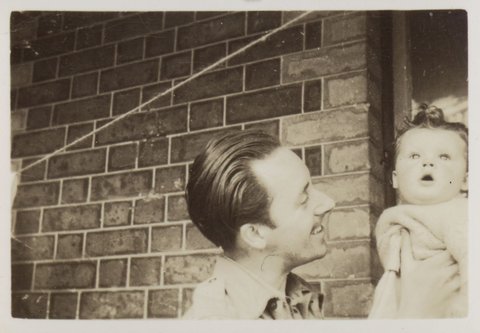 Tucker holding Sweeney on the balcony, Robe Street, St. Kilda, 1945–46