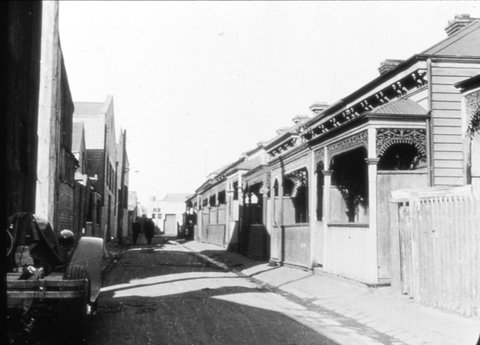 Melbourne. Street scene with terrace houses, c. 1935