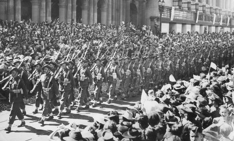 Military procession in Melbourne, Bourke Street and towards Elizabeth Street, 1943