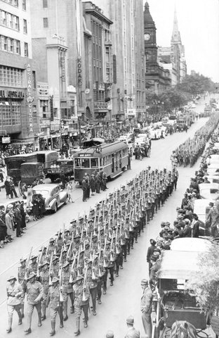 Cars and trams stopped on Collins Street for 2nd A.I.F. march, 1939–44