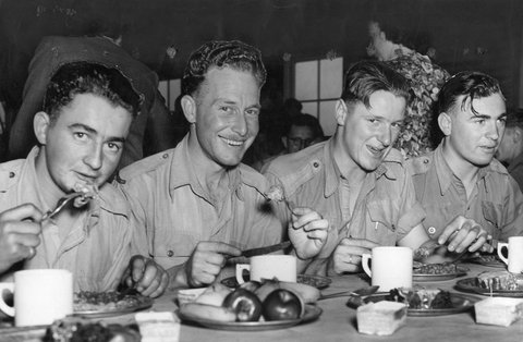 Back from the [illegible] a Christmas Dinner given by the Royal Park Camp Women's Auxiliary at a Leave & Transport camp, c. 1943