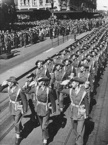 A.I.F. soldiers of the 9th Division in Swanston Street, during a march in Melbourne, 1943