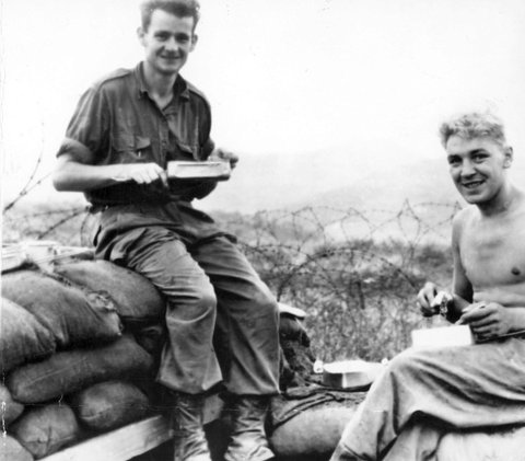 Private "Snowy" P.A. Brook, of West Melbourne and L/Col. Tim Hume, breakfast in view of the "enemy lines.", c. 1953