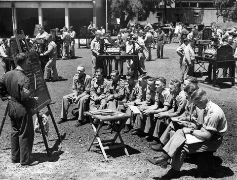 Practical instruction for A.I.F. Driver Mechanics and Mechanics M.T. at a Motor Vehicle Traide Training Centre near Melbourne, c. 1942